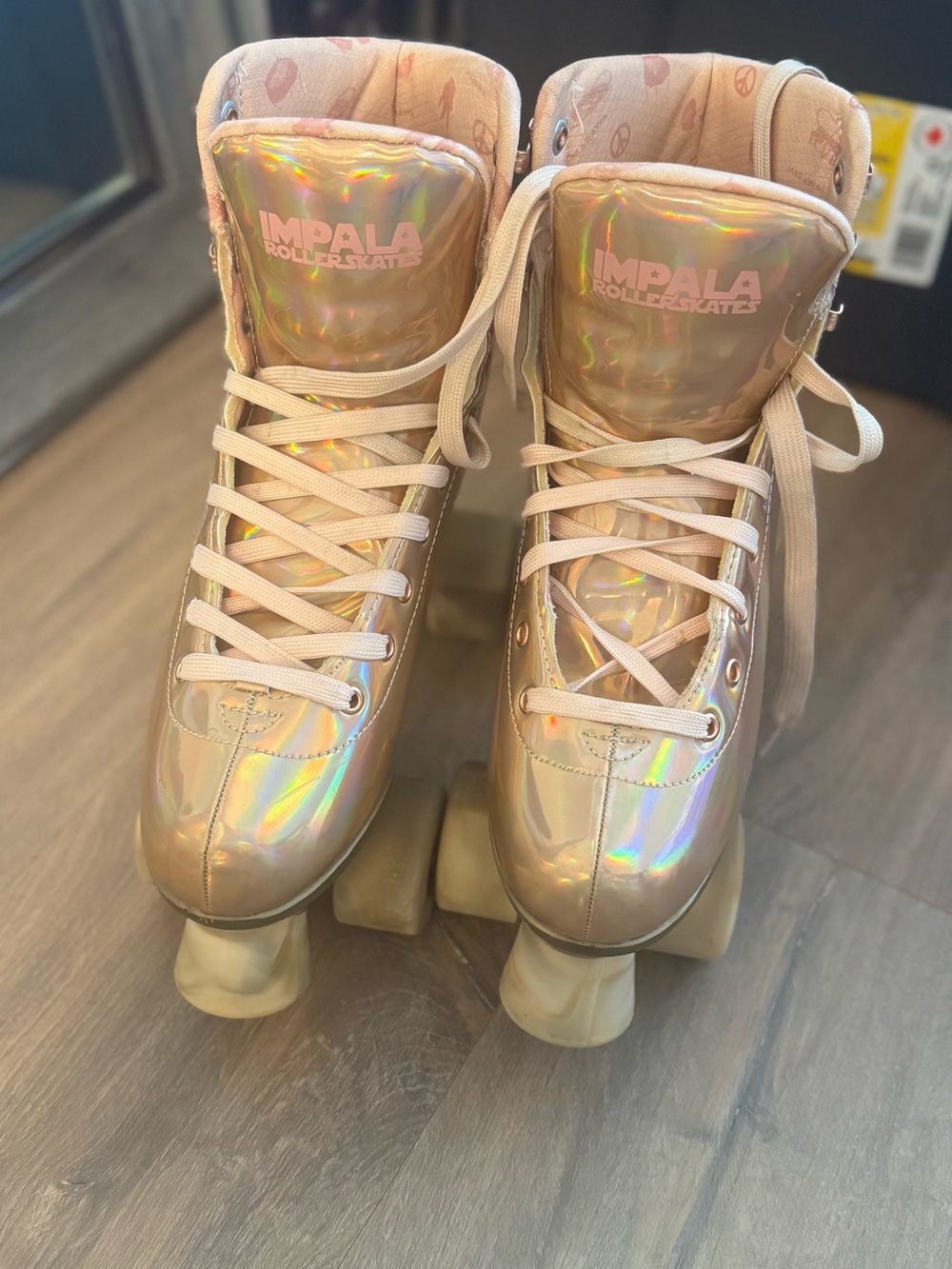 Holographic Pink Roller Skates